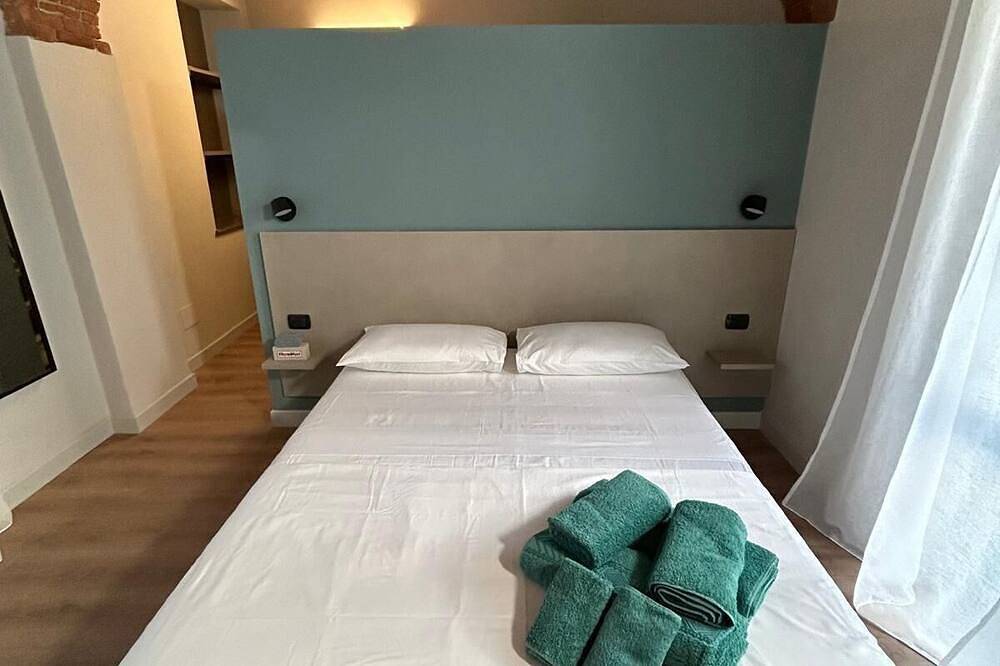 Appartement entier, Apartment with parking space located in the heart of the historic center in Alba (Piemont), Langhe
