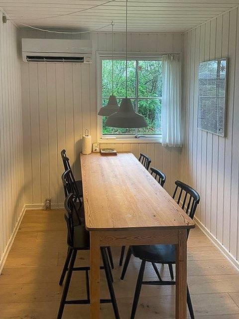 Ferienhaus mit Sonnenuntergang über der Sejerø-Bucht in Veddinge, Asnæs