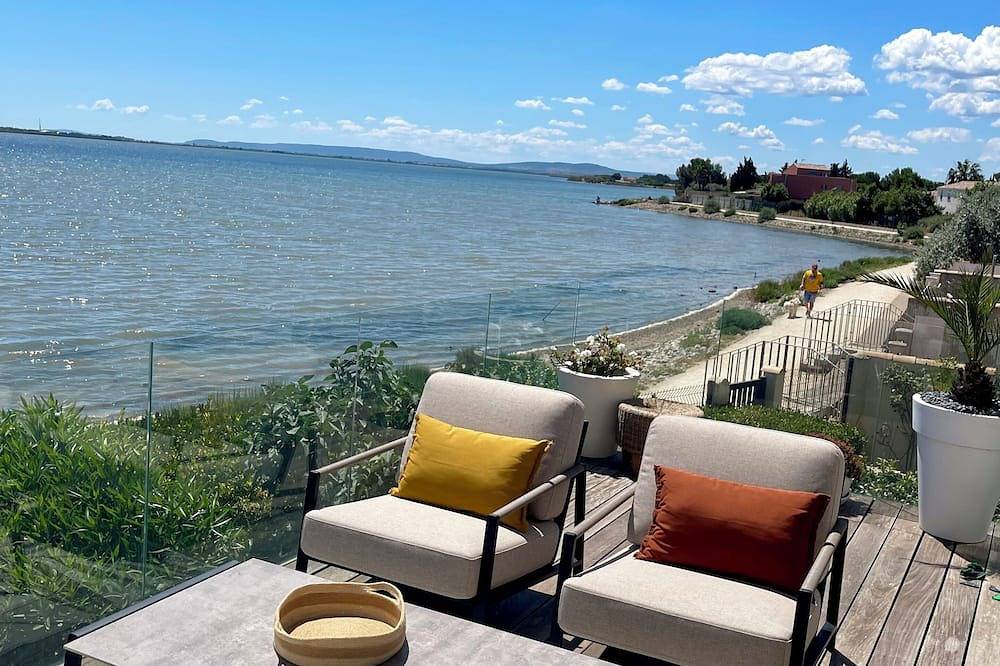 Design villa with panoramic pond view and jacuzzi in Pérols, Côte d'Améthyste