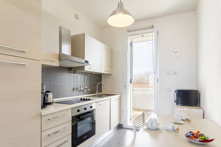 Entire apartment, Guesthost - Bright Balcony Apt with Sea-View in Livorno, Etruscan Coast