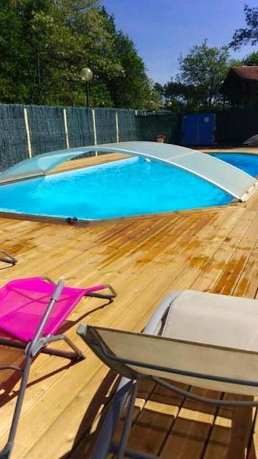 Location de vacances pour 8 personnes, avec terrasse ainsi que jardin et piscine à Escource - 3