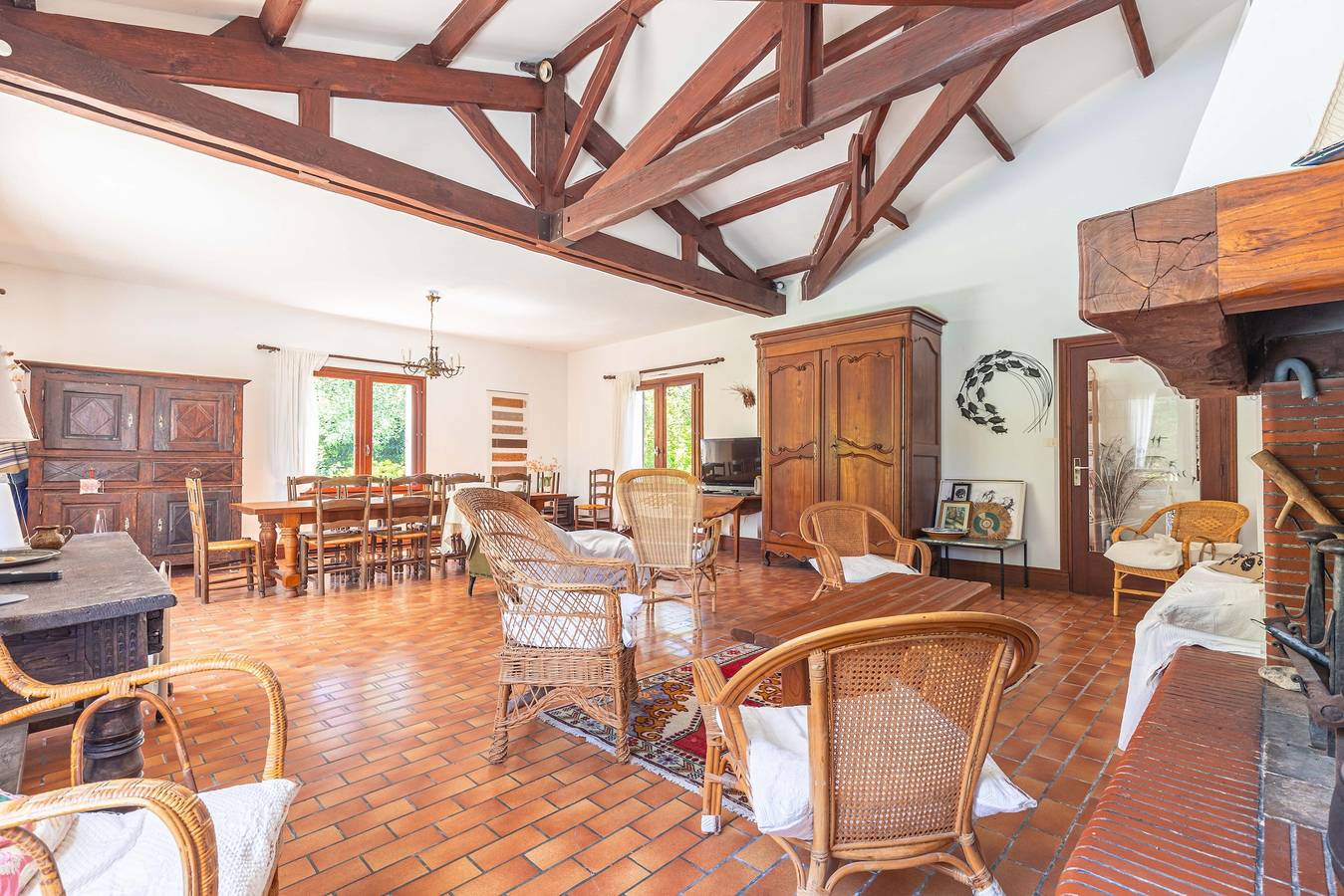 Familiehuis aan bosrand met terras, privétuin en balkon in Le Grand-Village-Plage, Côte de Beauté