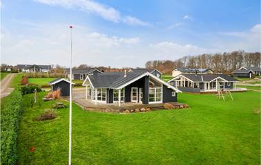 Ferienhaus für 6 Personen, mit Terrasse und Whirlpool sowie Garten in Mommark