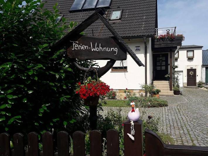 Ferienhaus für 4 Personen, mit Balkon und Garten