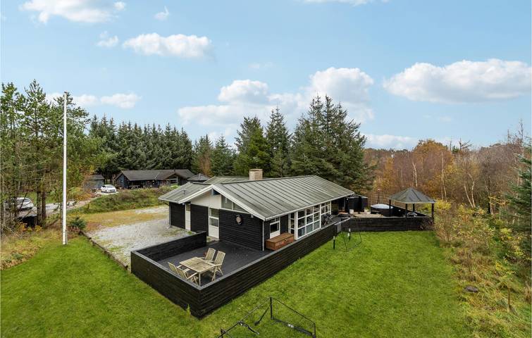 Ferienhaus für 8 Personen, mit Terrasse und Whirlpool sowie Garten und Sauna in Lodskovvad