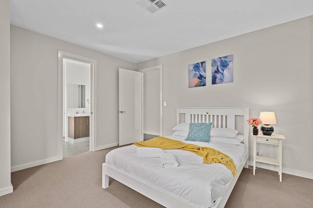 Meander ~ Port Noarlunga South - Perched up high on the red sandstone beach cliffs, your vantage point offers unrivalled views of where the Onkaparinga River meets the sea – just outside your front door. in Aldinga Beach, City of Onkaparinga