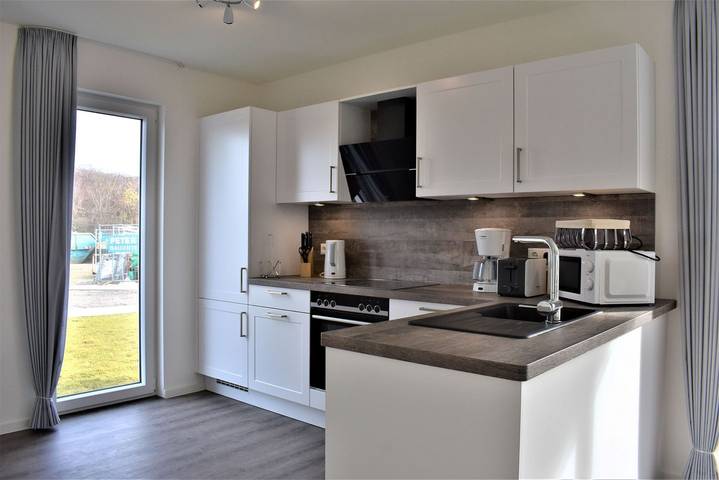 Ferienhaus für 6 Personen, mit Ausblick und Sauna sowie Terrasse, mit Haustier in Schillig