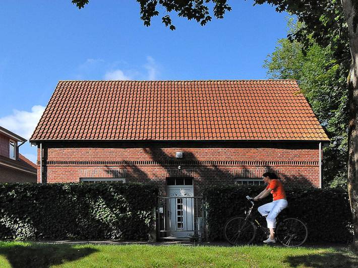 Bauernhof für 7 Personen, mit Terrasse und Garten sowie Seeblick in Esens