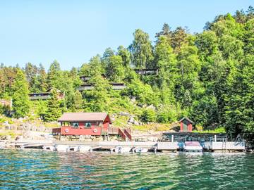 Ferienhaus für 5 Personen, mit Terrasse und Seeblick sowie Garten in Lyngdal
