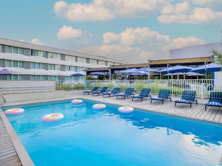 Hôtel pour 4 personnes, avec Terrasse ainsi que Jardin et Piscine