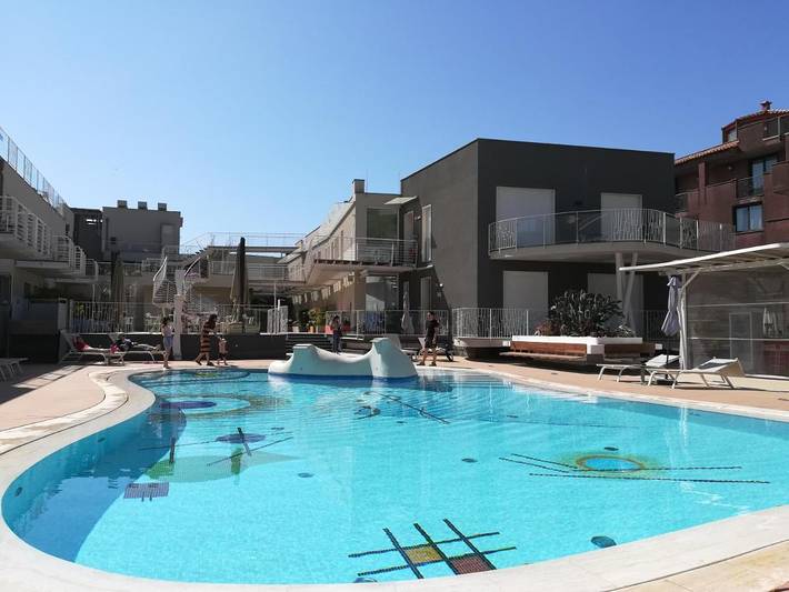Ferienhaus für 4 Personen, mit Balkon und Terrasse sowie Garten und Kinderpool