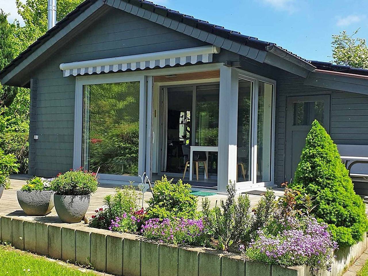 Blockhaus mit Wintergarten und Kamin - Blockhaus in Damp in Ostseebad Damp, Damp