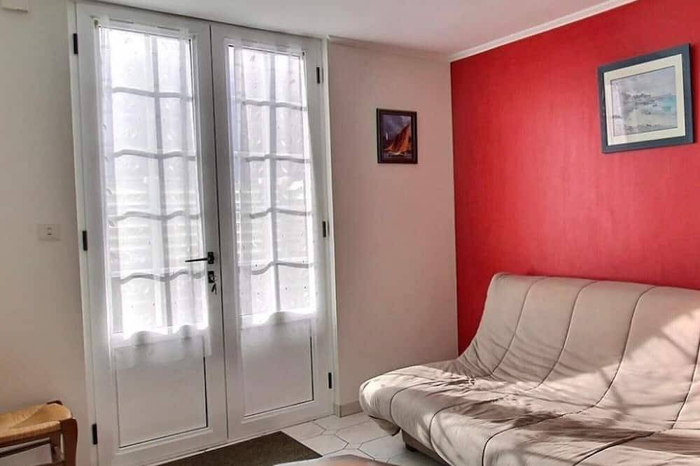 Maison de vacances « Gîte Ty Véranda » avec terrasse privée et jardin commun in Plomodiern, Région de Châteaulin