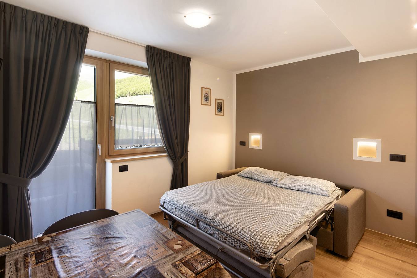 Apartamento entero, Apartamento "Federia Casa Campacc" con vistas al lago, jardín, terraza y Wi-Fi in Livigno (Town), Livigno