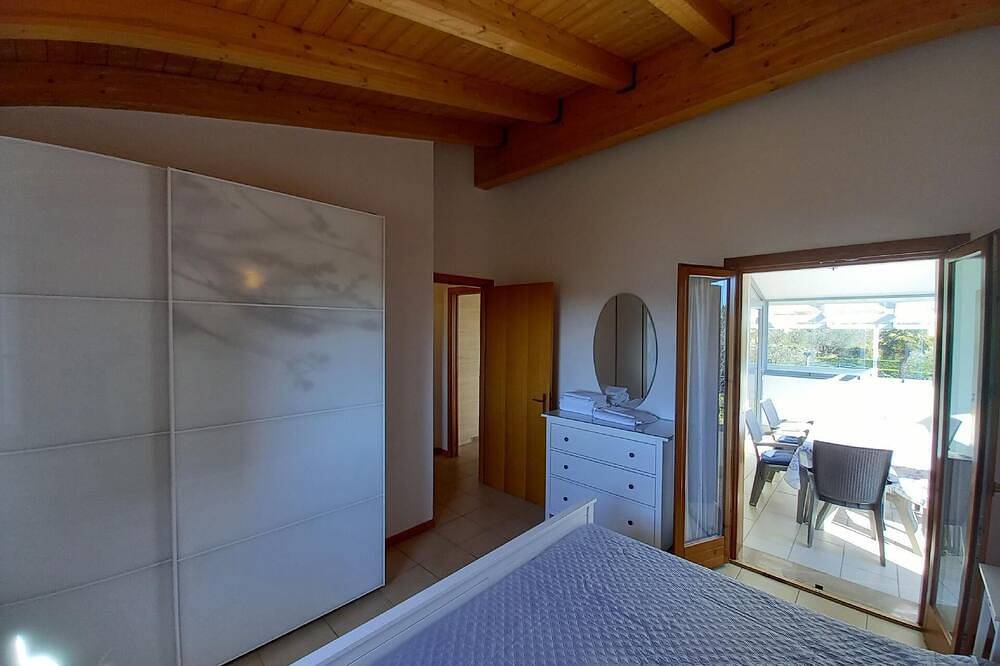 Ganze Wohnung, Charmante Wohnung in Colà mit Privatem Garten in Colà, Lazise