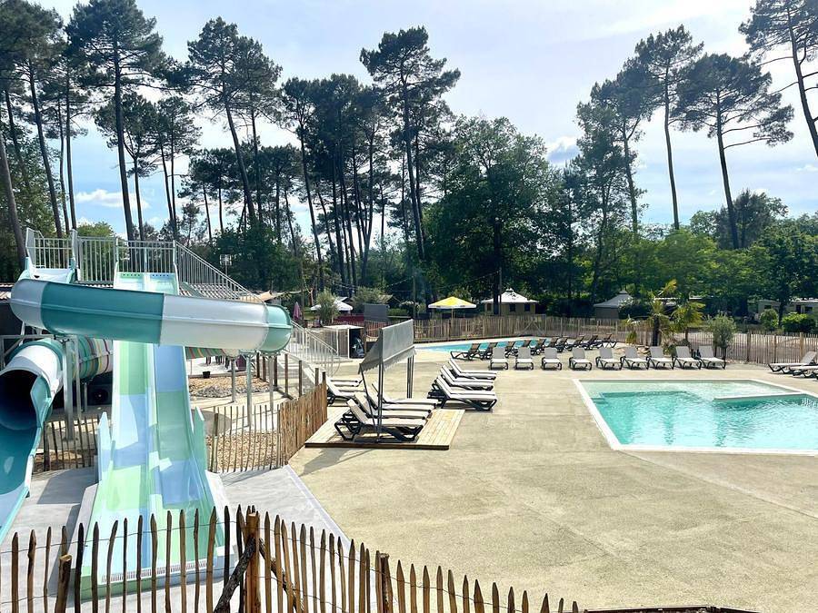 Camping Vert Bord D'eau - Canvas and wooden tent 4 persons - wooden floor, 2 bedrooms, fitted kitchen, terrace in Saint-Symphorien (Dordogne), Langon region
