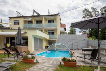 Ferienwohnung für 5 Personen, mit Sauna und Garten sowie Pool und Whirlpool, mit Haustier am Klopeiner See