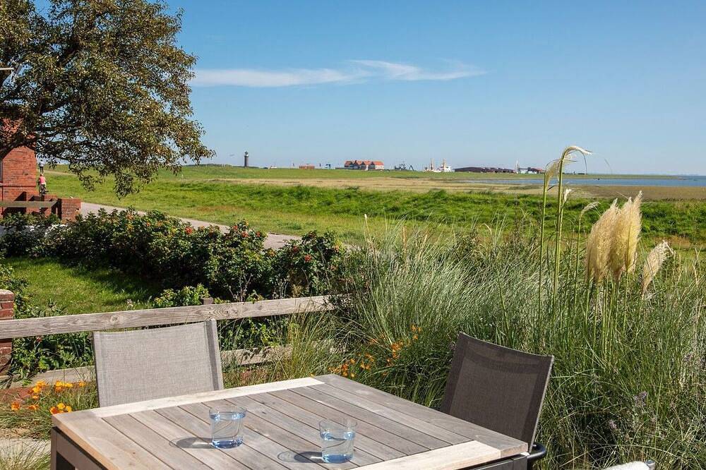 Familien- und hundefreundliche moderne Ferienwohnung mit Südterrasse am Watt — Bild 4