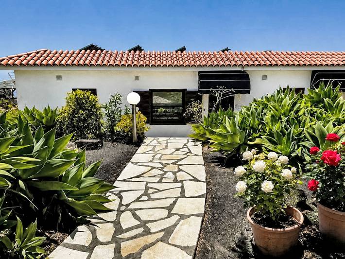 Ferienhaus für 3 Personen, mit Terrasse und Garten sowie Pool und Ausblick