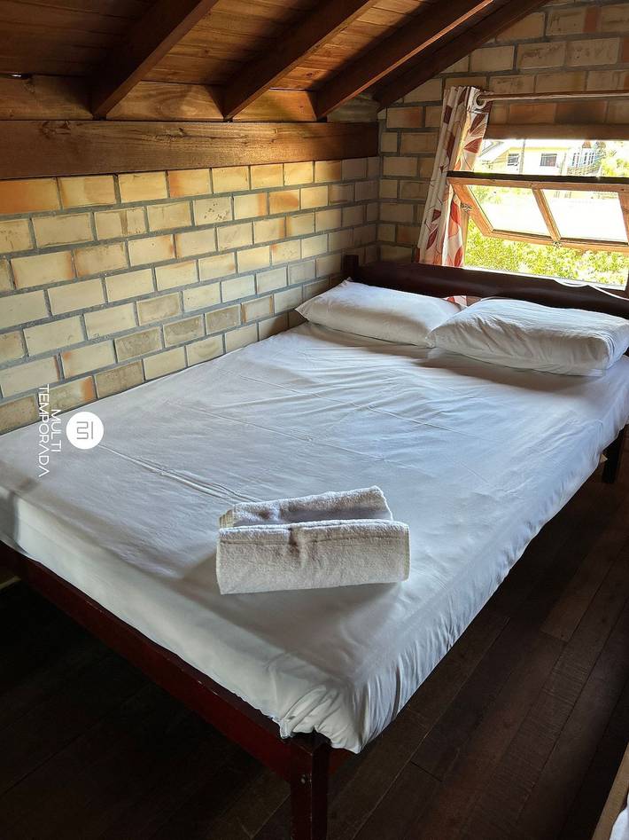 Casas e apartamentos de temporada para 7 pessoas, com jardim em Imbituba