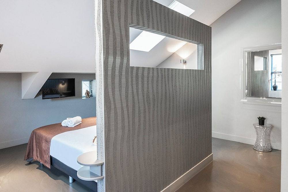 Ganze Wohnung, Genießen Sie einen entspannten Aufenthalt in unserer stilvollen Luxus-Suite in einer restaurierten alten Weberei in Oss. Ideal für Geschäfts- und Urlaubsreisende, mit Komfort und industriellem Charme. in Oss, Nordbrabant