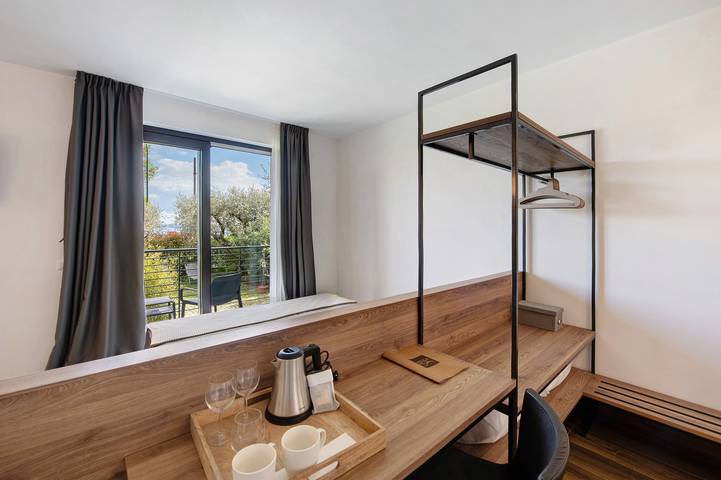 Ferienwohnung für 3 Personen, mit Balkon und Whirlpool sowie Garten und Seeblick in Moniga del Garda