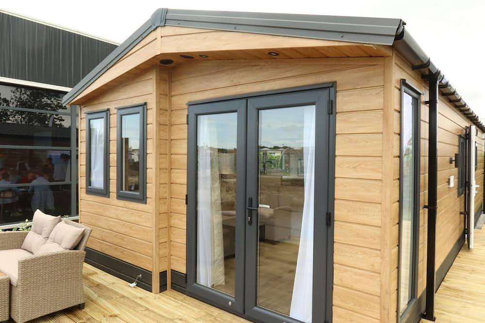 Enjoy your holiday in the Zeebries Cabin: a comfortable holiday home on the Flemish coast for 4 persons, fully equipped for a carefree stay. in Wenduine, Le Coq