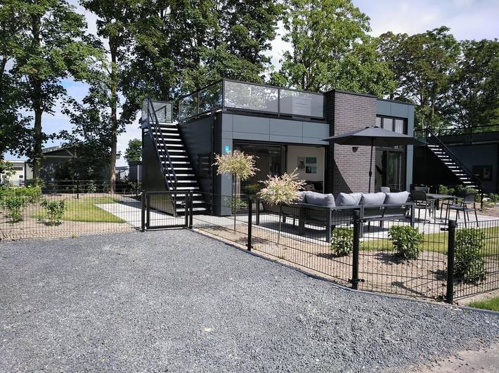 Vakantiehuis voor 6 personen, with sauna and uitzicht op het meer as well as tuin and zwembad, met huisdier in Hulshorst