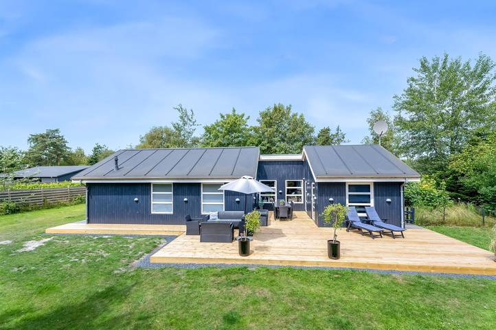 Chalet für 10 Personen, mit Whirlpool und Sauna sowie Terrasse und Garten in Dänemark