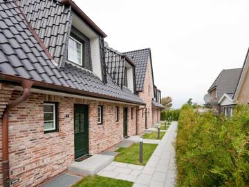 Ferienhaus für 8 Personen, mit Whirlpool und Terrasse sowie Garten und Sauna, kinderfreundlich in Tinnum
