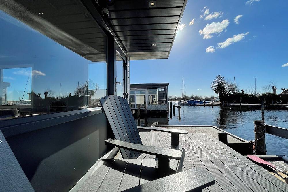 Poellodge, Hausboot mit herrlicher Terrasse und Aussicht. in Aalsmeer, Nordholland