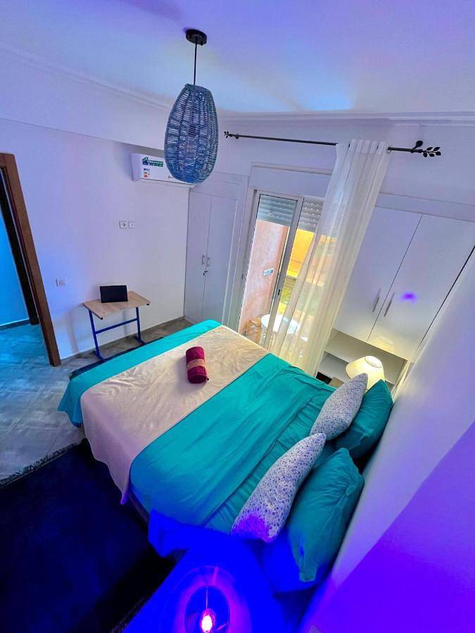 Appartement de vacances pour 4 personnes, avec terrasse et jardin ainsi que vue et piscine