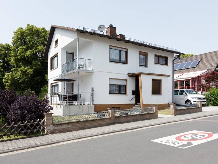 Ferienhaus für 6 Personen, mit Balkon und Terrasse sowie Garten