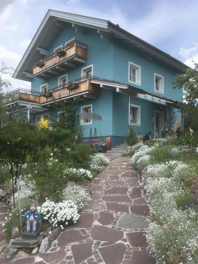 Ferienwohnung für 7 Personen, mit Balkon und Terrasse sowie Garten und Sauna in Saalfelden
