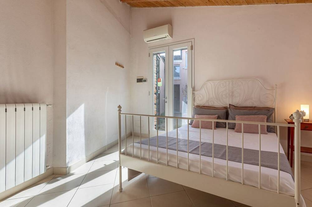 Appartamento intero, Guesthost - Ponte della Pitagora Apartment in Comacchio, Provincia di Ferrara