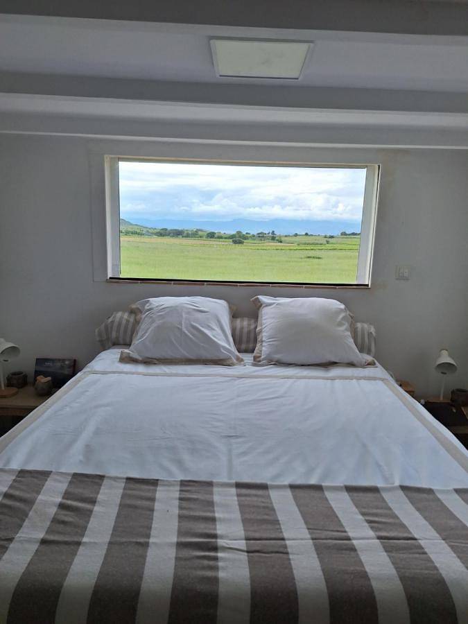 Location de vacances pour 4 personnes, avec piscine ainsi que vue et jardin à Vendémian