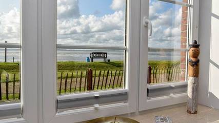 Ferienwohnung für 2 Personen, mit Seeblick und Garten sowie Terrasse, mit Haustier auf den Halligen