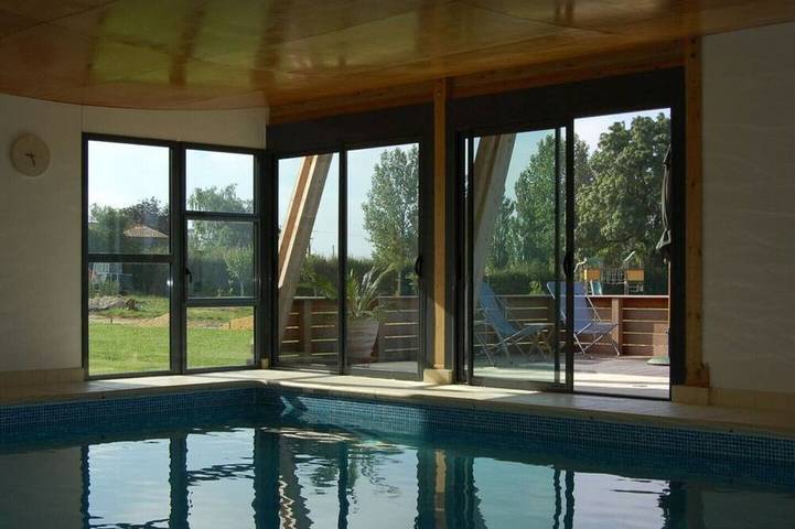 Appartement de vacances pour 4 personnes, avec Jacuzzi et Terrasse ainsi que Jardin et Piscine