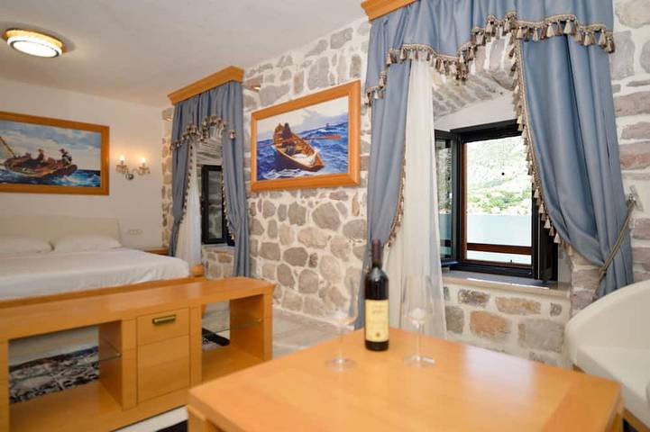 Waterfront Stone Home with Private Terrace & Direct Sea Access in Muo, Bay of Kotor
