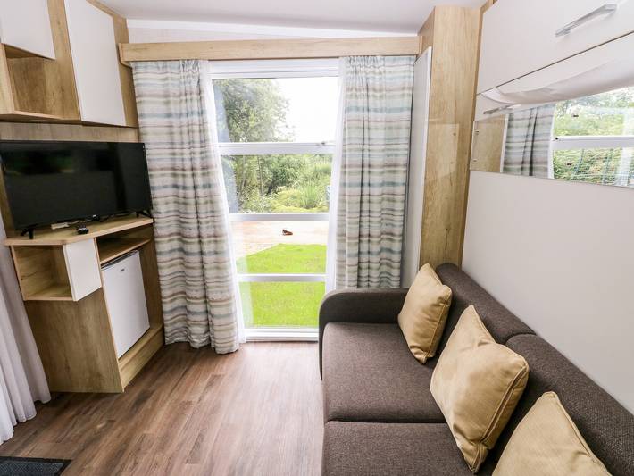 Hütte für 2 Personen mit Pool in Ferryside, Carmarthenshire