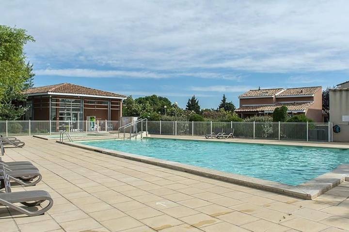 Appartement de vacances pour 4 personnes, avec Terrasse ainsi que Jardin et Piscine