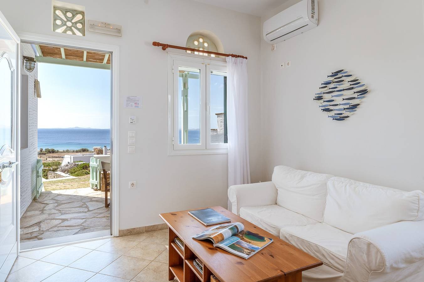 Ferienhaus 'Anemologio 102 Tinos' mit Meerblick, Wlan und Klimaanlage in Ormos Agiou Ioannou, Tínos