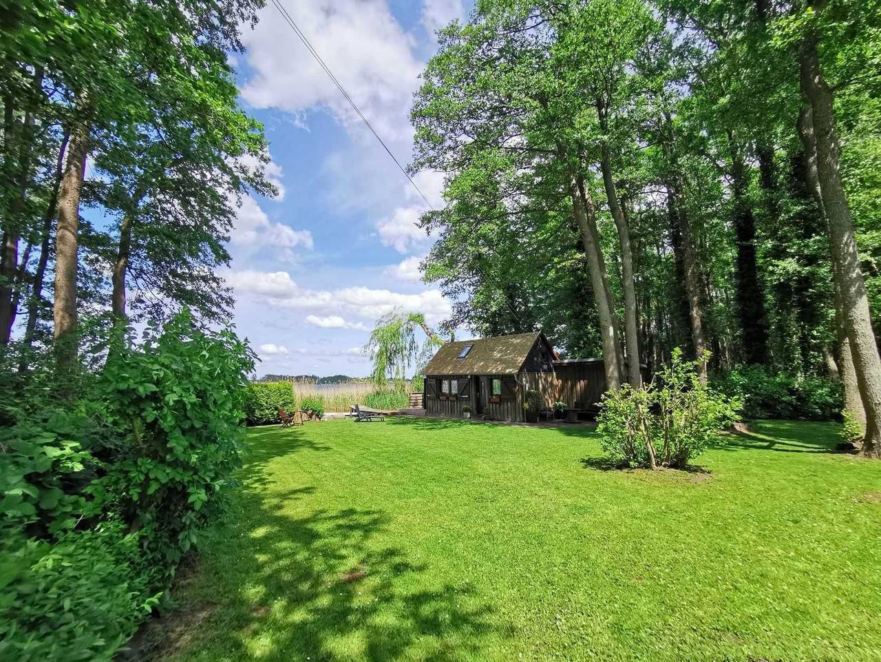 Am Inselsee - Ferienhaus - Ferienhaus am Inselsee in Mühl Rosin, Mecklenburgische Seenplatte