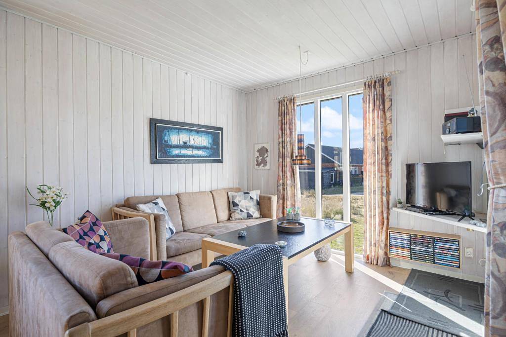Gemütliches Ferienhaus mit Infrarotsauna und Lademöglicheit in Nymindegab, Holmsland Klit