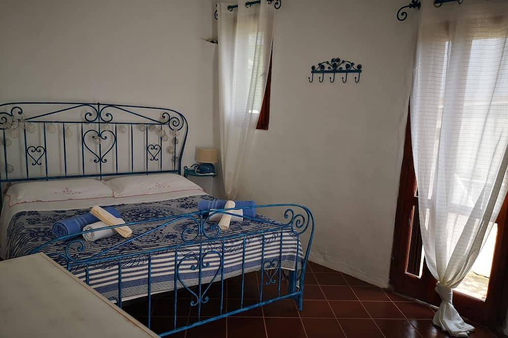 Casa adosada frente al mar (10 metros) con jardín privado Iun P5807 in Villasimius, Provincia de Cagliari