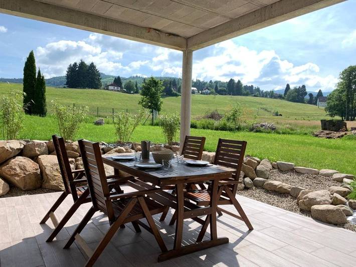 Appartement de vacances pour 4 personnes, avec Terrasse ainsi que Jardin et Vue