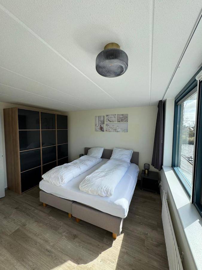Ferienhaus für 4 Personen, mit Terrasse und Garten sowie Seeblick und Ausblick in Lemmer - 3