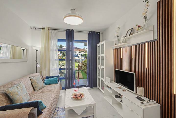 Casa Romantico - Playmar con piscina comunitaria, terraza privada y Wi-Fi in Maspalomas, San Bartolomé de Tirajana