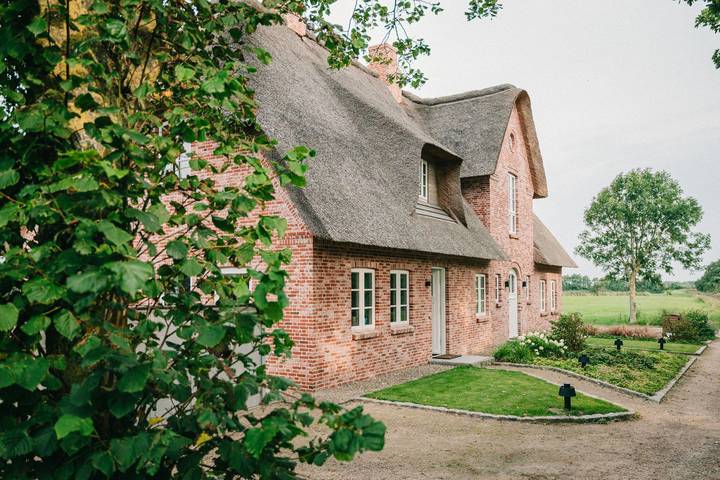 Ferienhaus für 7 Personen, mit Terrasse und Garten sowie Sauna und Ausblick in Midlum