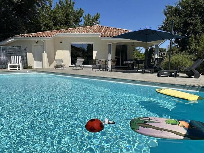 Maison de vacances pour 6 personnes, avec terrasse ainsi que piscine et jardin à Linxe